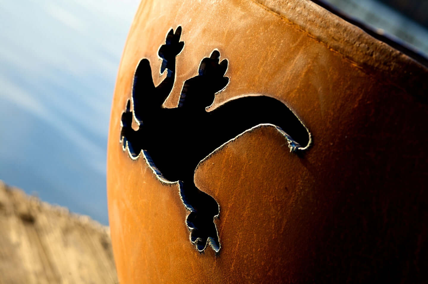 Kokopelli Fire Pit - side view logo